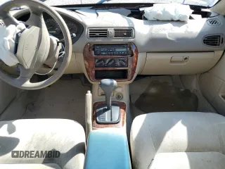 2000 Mitsubishi Galant ES with VIN 4A3AA46G4YE095879, listed as a Copart auction lot 70035904 with 180,089 mi miles and Salvage Title. Bid and sale history available at carsss.com. Image 8.