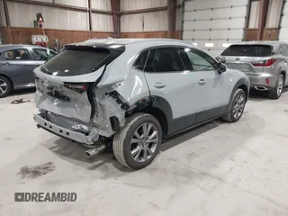 2025 Mazda CX-30 S Premium with VIN 3MVDMBDM5SM788786, listed as a IAAI auction lot 42126428 with 1,370 mi miles and . Bid and sale history available at DreamBid. Image 4.