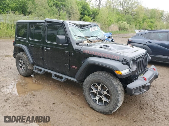 2021 Jeep Wrangler Unlimited Rubicon with VIN 1C4HJXFNXMW612186, listed as a Copart auction lot 56786665 with 52,379 mi miles and Salvage title. Bid and sale history available at DreamBid. Image 4.