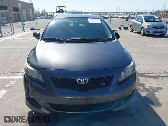 2009 Toyota Corolla with VIN 1NXBU40E19Z143959, listed as a IAAI auction lot 42032312 with 155,776 mi miles. Bid and sale history available at carsss.com. Image 12.
