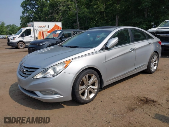 2012 Hyundai Sonata Limited z VIN 5NPEC4AB0CH451960, wystawiony jako IAAI lot #42489513 z przebiegiem 174 310 mil mil oraz . Historia ofert i sprzedaży dostępna na DreamBid. Obrazek 2.