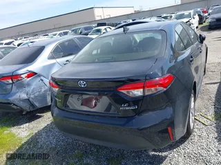 2024 Toyota Corolla Hybrid LE with VIN JTDBCMFE7R3054126, listed as a IAAI auction lot 41784668 with 15,864 mi miles. Bid and sale history available at carsss.com. Image 16.
