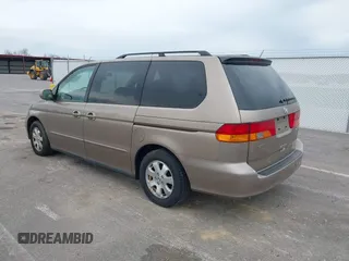 2004 Honda Odyssey EX-L with VIN 5FNRL18744B034830, listed as a IAAI auction lot 42052008 with 182,178 mi miles and . Bid and sale history available at DreamBid. Image 3.