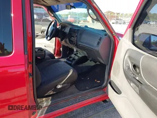 2003 Ford Ranger XL Fleet with VIN 1FTYR44UX3PB69581, listed as a IAAI auction lot 42077195 with 334,920 mi miles. Bid and sale history available at carsss.com. Image 5.
