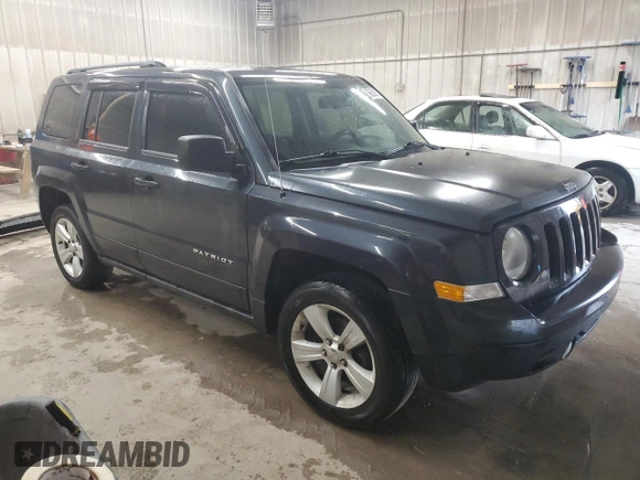2015 Jeep Patriot Latitude with VIN 1C4NJRFB0FD125811, listed as a Copart auction lot 56658815 with 169,500 mi miles and Clean title. Bid and sale history available at DreamBid. Image 4.