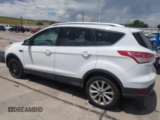 2013 Ford Escape SE with VIN 1FMCU9GX9DUD12210, listed as a Copart auction lot 62496095 with 77,516 mi miles and Salvage title. Bid and sale history available at DreamBid. Image 2.