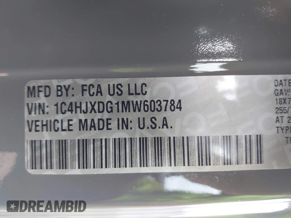 2021 Jeep Wrangler Unlimited Sport Altitude with VIN 1C4HJXDG1MW603784, listed as a IAAI auction lot 41509231 with 102,567 mi miles and . Bid and sale history available at DreamBid. Image 9.