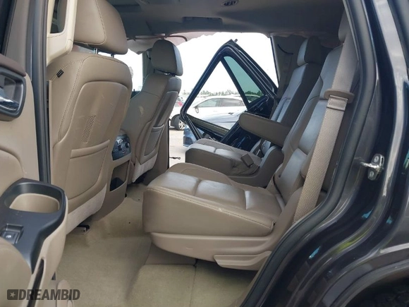 2016 GMC Yukon SLT with VIN 1GKS2BKC1GR406739, listed as a IAAI auction lot 41247286 with 106,023 mi miles. Bid and sale history available at carsss.com. Image 8.
