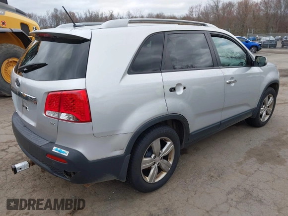 2012 Kia Sorento EX with VIN 5XYKU3A60CG225714, listed as a IAAI auction lot 42057812 with 167,850 mi miles. Bid and sale history available at carsss.com. Image 4.