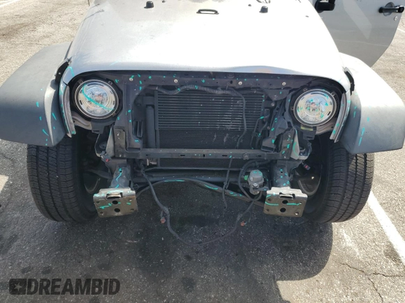 2018 Jeep Wrangler JK Unlimited Sport S with VIN 1C4BJWDG5JL811003, listed as a Copart auction lot 70633564 with 94,477 mi miles and Salvage Title. Bid and sale history available at carsss.com. Image 12.