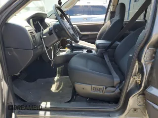 2004 Jeep Grand Cherokee Laredo with VIN 1J4GW48S54C430857, listed as a Copart auction lot 62744305 with 122,099 mi miles and Salvage title. Bid and sale history available at DreamBid. Image 7.