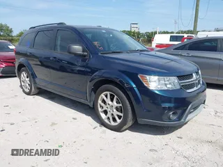 2014 Dodge Journey SXT with VIN 3C4PDCBG3ET218328, listed as a IAAI auction lot 42086656 with 55,620 mi miles. Bid and sale history available at carsss.com. Image 1.