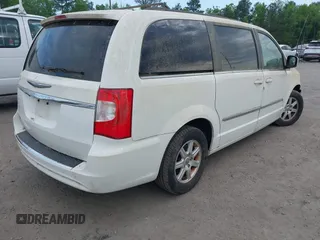2012 Chrysler Town & Country Touring with VIN 2C4RC1BG6CR350676, listed as a IAAI auction lot 42162888 with 94,095 mi miles. Bid and sale history available at carsss.com. Image 4.