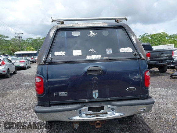 2001 Ford F-150 XLT z VIN 1FTRW07L21KC31753, wystawiony jako IAAI lot #42258913 z przebiegiem 205 960 mil mil oraz . Historia ofert i sprzedaży dostępna na DreamBid. Obrazek 16.