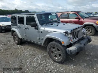 2013 Jeep Wrangler Unlimited Sport with VIN 1C4BJWDG1DL601972, listed as a Copart auction lot 65069824 with 166,274 mi miles and Salvage Title. Bid and sale history available at carsss.com. Image 4.