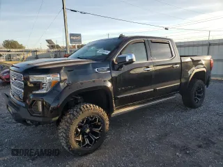 2020 GMC Sierra 1500 Denali with VIN 1GTU9FEL5LZ106974, listed as a Copart auction lot 83200414 with 33,119 mi miles and Salvage Title. Bid and sale history available at carsss.com. Image 1.