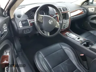2010 Jaguar XK with VIN SAJWA4GB7ALB35518, listed as a Copart auction lot 86475814 with 32,910 mi miles and Salvage Title. Bid and sale history available at carsss.com. Image 8.