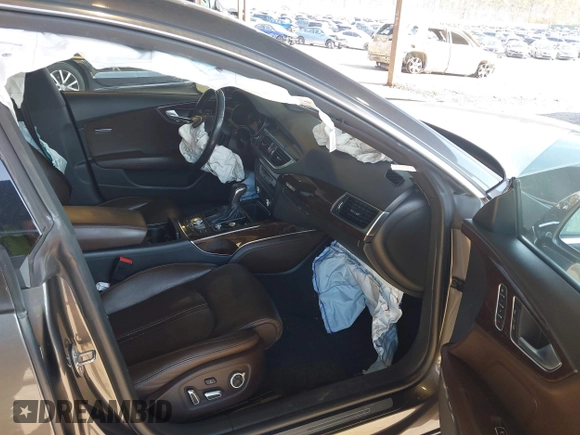 2016 Audi A7 3.0 Prestige with VIN WAU2GAFC5GN197012, listed as a IAAI auction lot 41908607 with 86,084 mi miles. Bid and sale history available at carsss.com. Image 5.