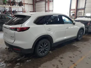 2020 Mazda CX-9 Touring z VIN JM3TCBCY8L0405360, wystawiony jako IAAI lot #41419428 z przebiegiem 69 917 mil mil oraz . Historia ofert i sprzedaży dostępna na DreamBid. Obrazek 4.