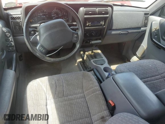 1998 Jeep Cherokee Sport with VIN 1J4FJ68S2WL285432, listed as a Copart auction lot 57183145 with 284,162 mi miles and Clean title. Bid and sale history available at DreamBid. Image 8.