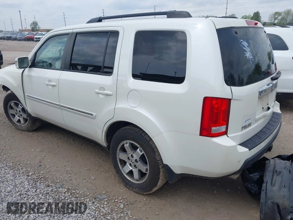 2011 Honda Pilot Touring z VIN 5FNYF4H96BB106873, wystawiony jako IAAI lot #42154795 z przebiegiem 162 282 mil mil oraz . Historia ofert i sprzedaży dostępna na DreamBid. Obrazek 3.