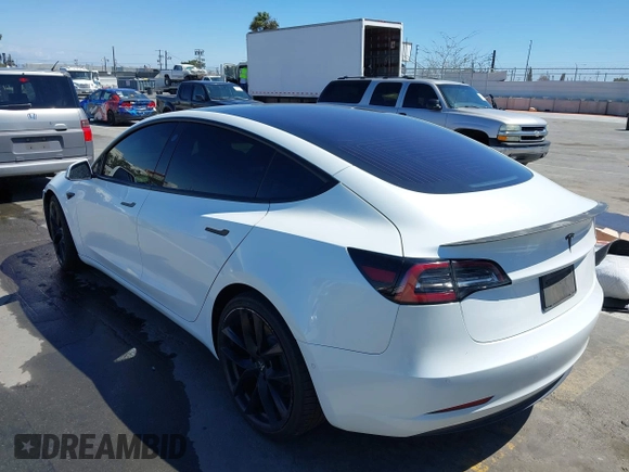 2019 Tesla Model 3 Mid Range with VIN 5YJ3E1EA5KF327181, listed as a IAAI auction lot 41860943 with 157,335 mi miles and . Bid and sale history available at DreamBid. Image 3.