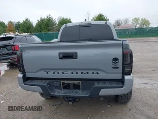2021 Toyota Tacoma SR z VIN 3TMCZ5AN5MM372821, wystawiony jako IAAI lot #41886586 z przebiegiem 68 878 mil mil oraz . Historia ofert i sprzedaży dostępna na DreamBid. Obrazek 16.