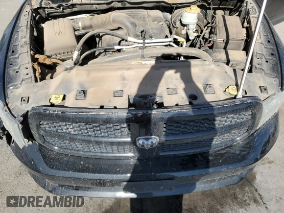 2014 Ram 1500 Tradesman z VIN 3C6JR7AT0EG123027, wystawiony jako Copart lot #51456875 z przebiegiem 115 036 mil mil oraz Szkoda całkowita • Salvage title. Historia ofert i sprzedaży dostępna na DreamBid. Obrazek 11.