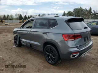 2022 Volkswagen Taos SE z VIN 3VVLX7B28NM041868, wystawiony jako Copart lot #53472735 z przebiegiem 80 509 mil mil oraz Szkody całkowita. Historia ofert i sprzedaży dostępna na DreamBid. Obrazek 2.