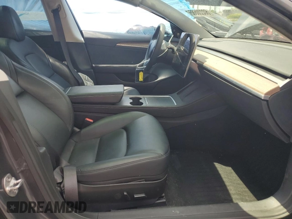 2023 Tesla Model 3 with VIN 5YJ3E1EA8PF704349, listed as a Copart auction lot 60220665 with 18,873 mi miles and Non repairable. Bid and sale history available at DreamBid. Image 7.