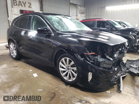 2021 Ford Escape Titanium Hybrid with VIN 1FMCU9DZ5MUB33023, listed as a Copart auction lot 42180155 with 56,230 mi miles and Salvage title. Bid and sale history available at DreamBid. Image 4.