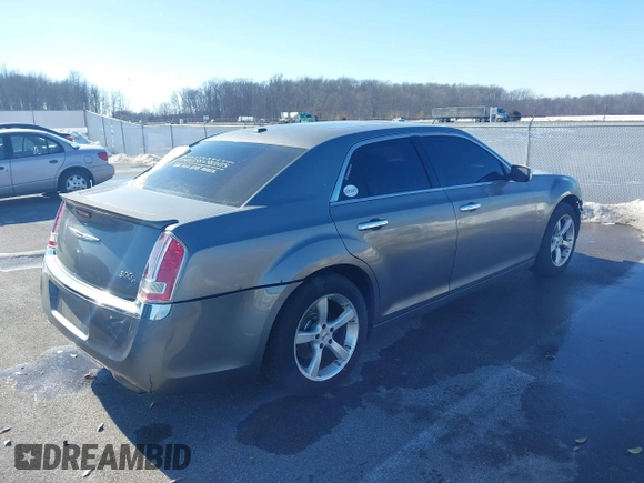 2011 Chrysler 300 with VIN 2C3CA6CTXBH563112, listed as a IAAI auction lot 41374372 with 151,947 mi miles. Bid and sale history available at carsss.com. Image 4.