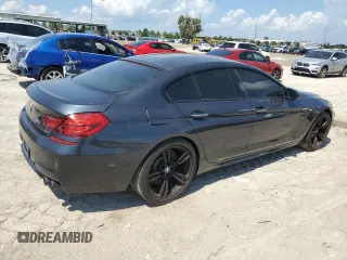 2015 BMW M6 z VIN WBS6C9C52FD468030, wystawiony jako Copart lot #70863134 z przebiegiem 66 839 mil mil oraz Szkoda całkowita • Salvage title. Historia ofert i sprzedaży dostępna na DreamBid. Obrazek 3.
