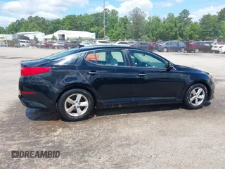 2015 Kia Optima LX with VIN 5XXGM4A71FG387980, listed as a IAAI auction lot 42330602 with 96,189 mi miles and . Bid and sale history available at DreamBid. Image 13.