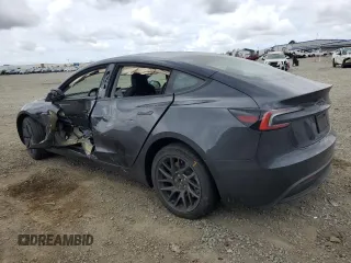 2025 Tesla Model 3 Long Range z VIN 5YJ3E1EA9SF892355, wystawiony jako Copart lot #52565545 z przebiegiem 12 825 mil mil oraz Szkoda całkowita • Salvage title. Historia ofert i sprzedaży dostępna na DreamBid. Obrazek 2.
