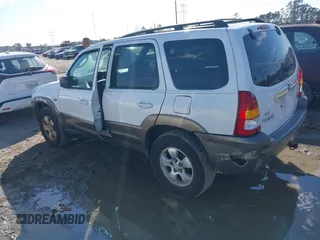 2004 Mazda Tribute ES with VIN 4F2CZ06164KM12579, listed as a IAAI auction lot 41654646 with 208,120 mi miles. Bid and sale history available at carsss.com. Image 3.