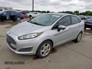 2014 Ford Fiesta SE z VIN 3FADP4BJ0EM203197, wystawiony jako Copart lot #60805745 z przebiegiem 236 076 mil mil oraz Czysty tytuł • Clean title. Historia ofert i sprzedaży dostępna na DreamBid. Obrazek 1.