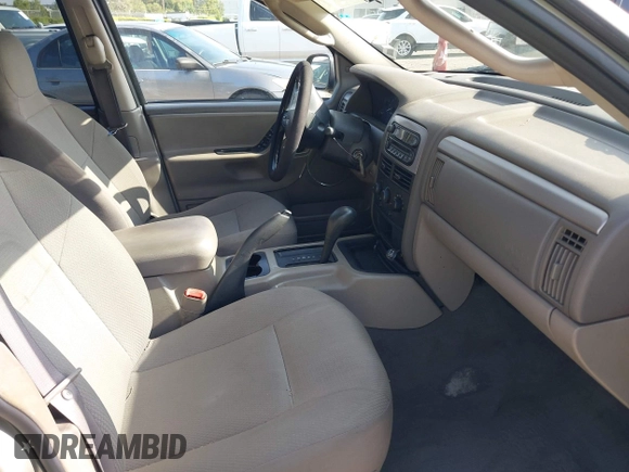 2004 Jeep Grand Cherokee Laredo with VIN 1J4GX48N24C334983, listed as a IAAI auction lot 42522088 with 169,793 mi miles and . Bid and sale history available at DreamBid. Image 5.