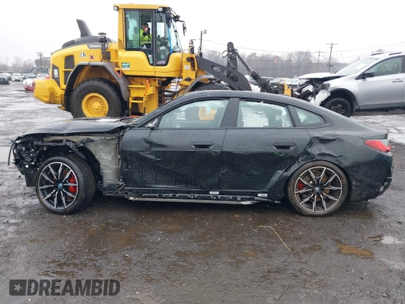 2024 BMW i4 M50 z VIN WBY33AW00RFS06591, wystawiony jako IAAI lot #41863252 z przebiegiem 15 260 mil mil oraz . Historia ofert i sprzedaży dostępna na DreamBid. Obrazek 14.
