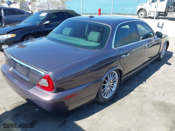 2008 Jaguar XJ with VIN SAJWA71B68SH22853, listed as a IAAI auction lot 41678688 with 76,367 mi miles. Bid and sale history available at carsss.com. Image 4.