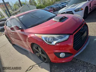 2013 Hyundai Veloster Turbo w/Black Int with VIN KMHTC6AE4DU142055, listed as a Copart auction lot 54666655 with 110,777 mi miles and Clean Title. Bid and sale history available at carsss.com. Image 1.