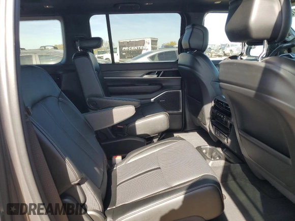 2024 Jeep Wagoneer Series II z VIN 1C4SJUBP3RS122179, wystawiony jako Copart lot #84817074 z przebiegiem 5 190 mil mil oraz Nie do naprawy • Non repairable. Historia ofert i sprzedaży dostępna na DreamBid. Obrazek 11.