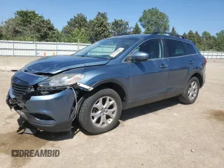 2014 Mazda CX-9 Sport z VIN JM3TB2BAXE0441433, wystawiony jako Copart lot #57179605 z przebiegiem 171 908 mil mil oraz Szkoda całkowita • Salvage title. Historia ofert i sprzedaży dostępna na DreamBid. Obrazek 1.