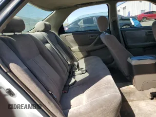 1998 Toyota Camry LE z VIN JT2BF28K3W0115122, wystawiony jako Copart lot #52645095 z przebiegiem 361 549 mil mil oraz Szkoda całkowita • Salvage title. Historia ofert i sprzedaży dostępna na DreamBid. Obrazek 10.