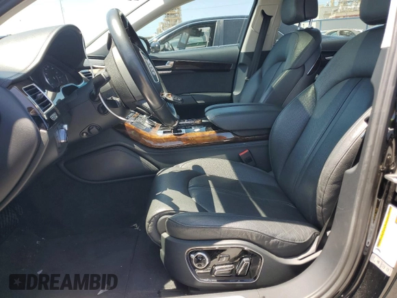 2018 Audi A8 z VIN WAU44AFD0JN000880, wystawiony jako Copart lot #54751235 z przebiegiem 76 161 mil mil oraz Szkody całkowita. Historia ofert i sprzedaży dostępna na DreamBid. Obrazek 7.