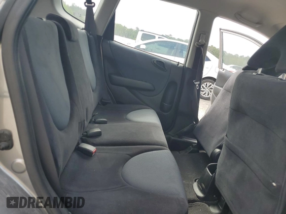 2007 Honda Fit z VIN JHMGD38477S043937, wystawiony jako Copart lot #58495495 z przebiegiem 101 800 mil mil oraz Szkoda całkowita • Salvage title. Historia ofert i sprzedaży dostępna na DreamBid. Obrazek 10.