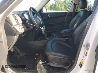 2019 MINI Countryman Cooper with VIN WMZYV5C51K3F57741, listed as a Copart auction lot 71293094 with 64,761 mi miles and Salvage Title. Bid and sale history available at carsss.com. Image 7.