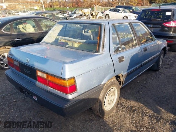 1986 Honda Civic z VIN JHMAK7439GS063929, wystawiony jako IAAI lot #41594413 z przebiegiem Nie podano mil oraz . Historia ofert i sprzedaży dostępna na DreamBid. Obrazek 4.