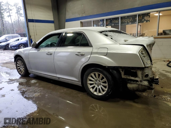 2012 Chrysler 300 with VIN 2C3CCAAG7CH117018, listed as a Copart auction lot 48672635 with 195,880 mi miles and Salvage Title. Bid and sale history available at carsss.com. Image 2.