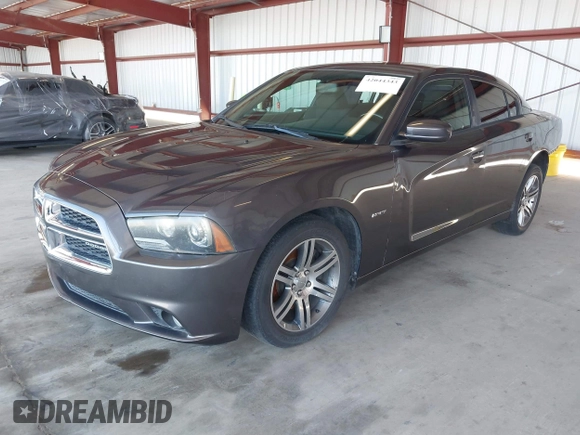 2013 Dodge Charger RT with VIN 2C3CDXCT0DH745384, listed as a IAAI auction lot 42044343 with 147,100 mi miles. Bid and sale history available at carsss.com. Image 2.